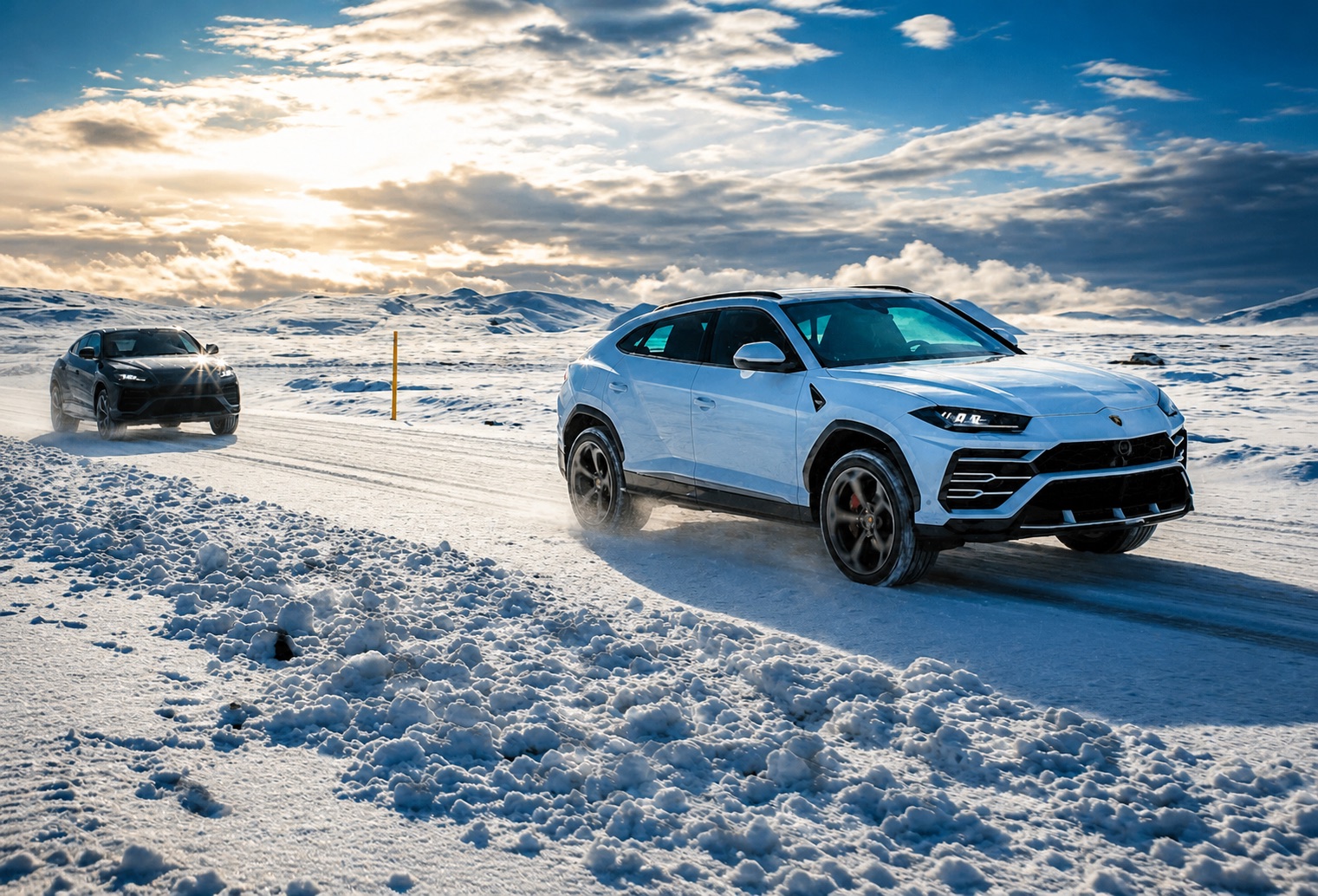Lamborghini Urus convoy on a snowy road